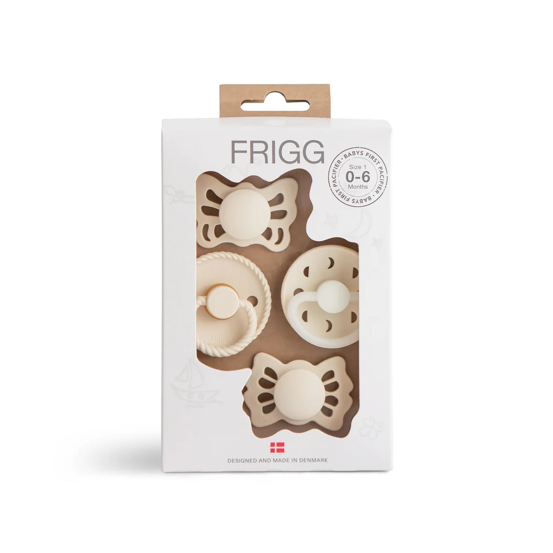 FRIGG Baby's First Moonlight Sailing Cream pacifier 4-pack - four newborn soothers in cream sailing packaging