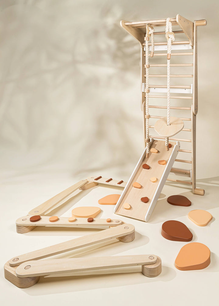 The Coco Village Montessori 2-in-1 Grip Climber Board & Slide in Natural blends function and form as a top-rated developmental toy.