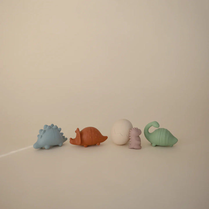 dinosaur shaped baby bath toys by mushie 