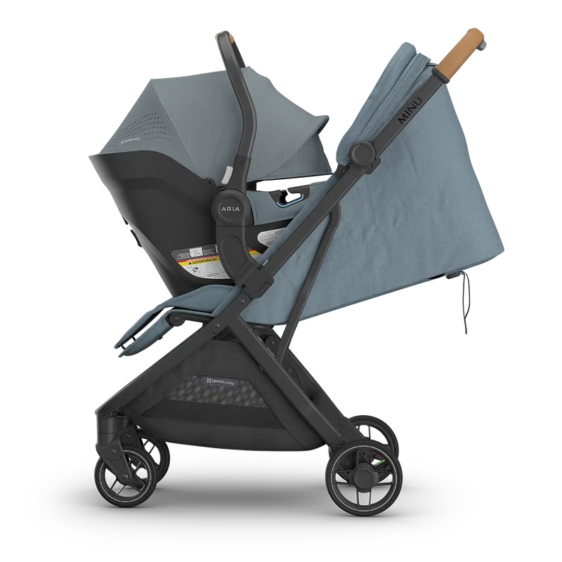 side view of uppababy callum stone blue aria v2 and minu v3 stroller for families