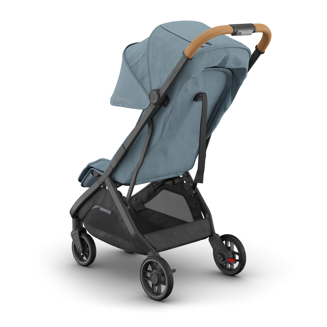 UPPAbaby Minu V3 Dillan travel stroller with sunshade extended, rear view. Compact and stylish for on-the-go families.