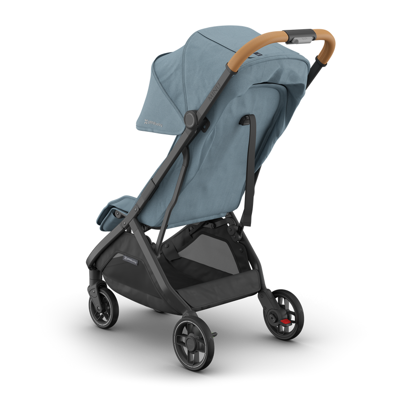 UPPAbaby Minu V3 Dillan travel stroller with sunshade extended, rear view. Compact and stylish for on-the-go families.