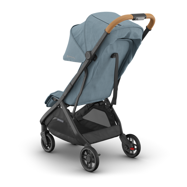 UPPAbaby Minu V3 Dillan travel stroller with sunshade extended, rear view. Compact and stylish for on-the-go families.