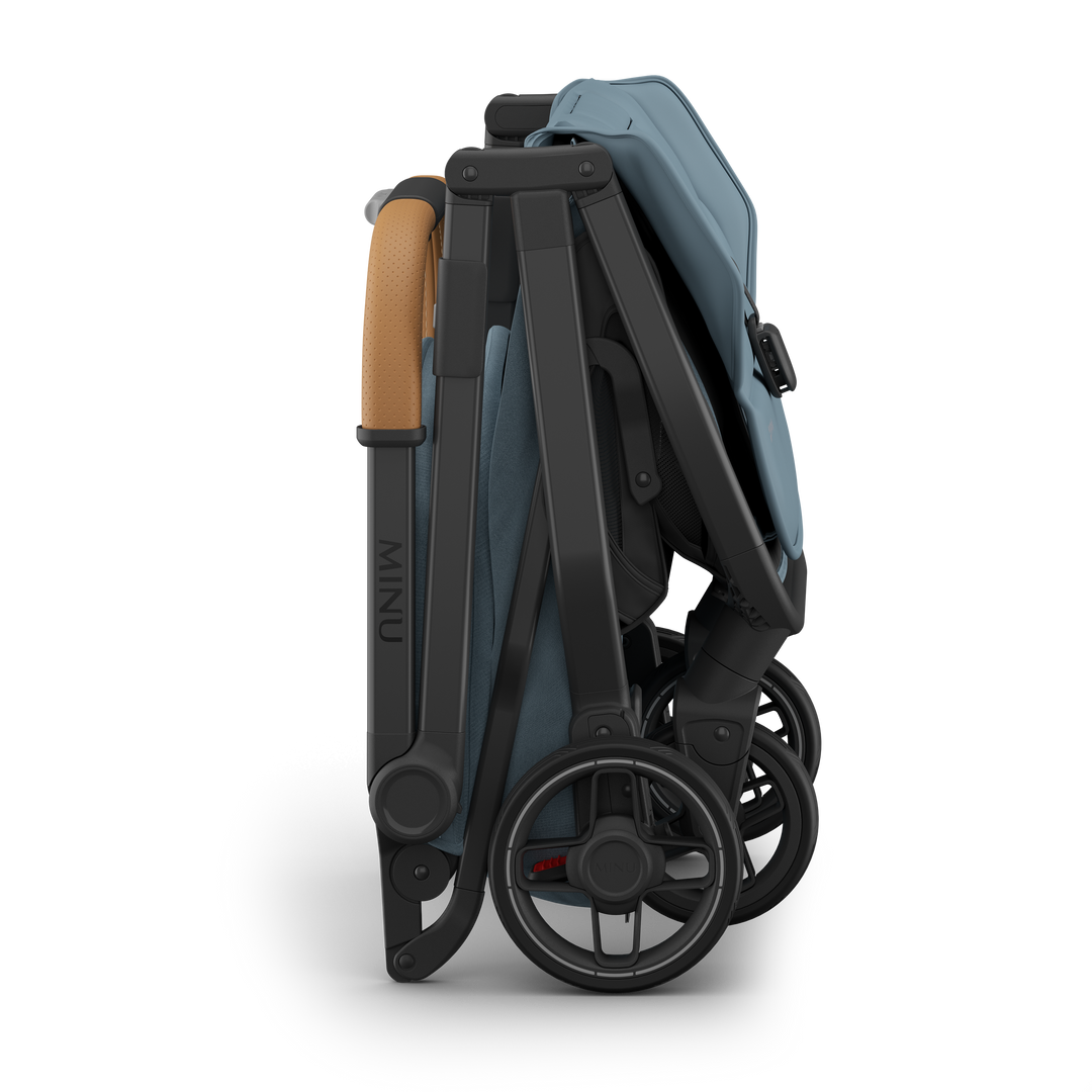 Foldable and compact, the UPPAbaby Minu V3 in Dillan is the best umbrella stroller for families.