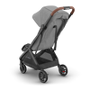 Baby stroller UPPAbaby Minu V3 Greyson, rear three-quarter view, sleek and functional design.