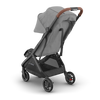 UPPAbaby Minu V3 Greyson stroller with sunshade extended, compact and stylish for travel.