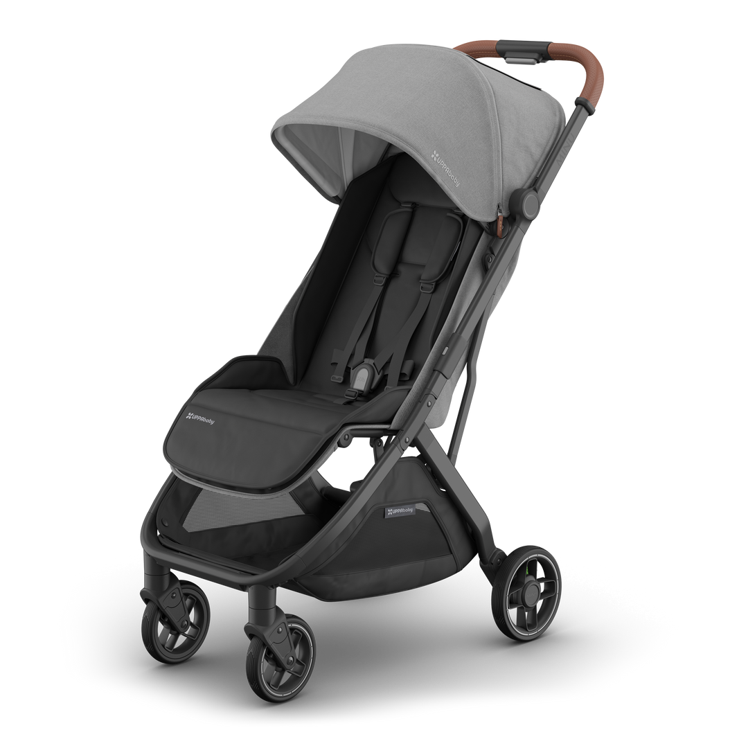 Toddler stroller UPPAbaby Minu V3 Greyson, side-angle hero shot, lightweight and modern.