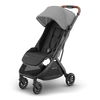 Toddler stroller UPPAbaby Minu V3 Greyson, side-angle hero shot, lightweight and modern.