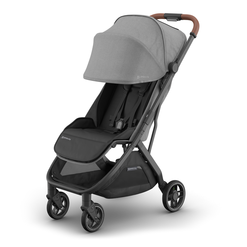 Stroll in style with the UPPAbaby Minu V3 Greyson, sunshade extended for extra coverage.