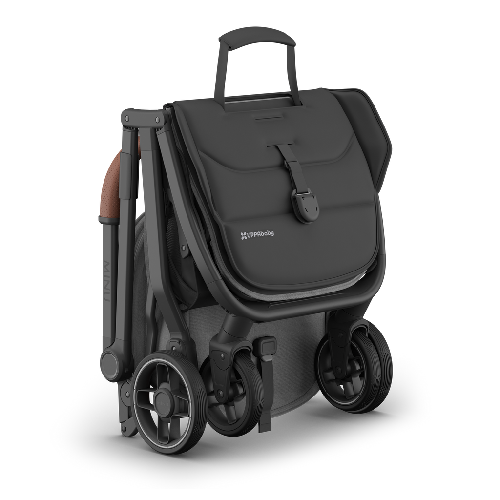 Lightweight stroller UPPAbaby Minu V3 Greyson, folded view with carry strap.