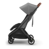 Baby stroller UPPAbaby Minu V3 Greyson, side-left view, sleek and functional design for toddlers.