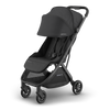 Best travel stroller UPPAbaby Minu V3 Jake, sunshade extended, ensuring comfort for your baby.