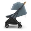 Side left view of UPPAbaby Minu V3 Dillan, offering a lightweight stroller with premium features.