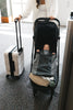 UPPAbaby Minu V3 Jake in the airport Ð lightweight stroller for easy travel with a toddler.