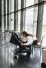 UPPAbaby Minu V3 Jake seen in an airport Ð lightweight stroller designed for travel.