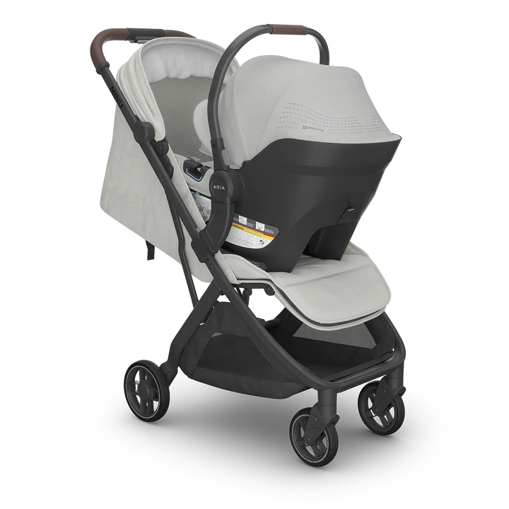 uppa baby lightweight car seat aria v2 on minu v3 lightweight stroller in light grey