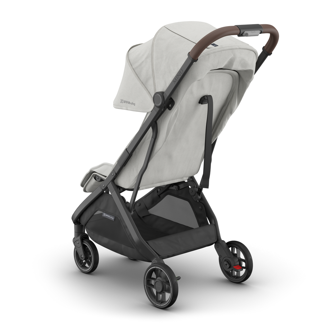 UPPAbaby Minu V3 Savannah Ð 3-quarter back view with sunshade for enhanced stroller comfort.