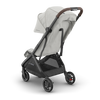 UPPAbaby Minu V3 Savannah Ð 3-quarter back view with sunshade for enhanced stroller comfort.