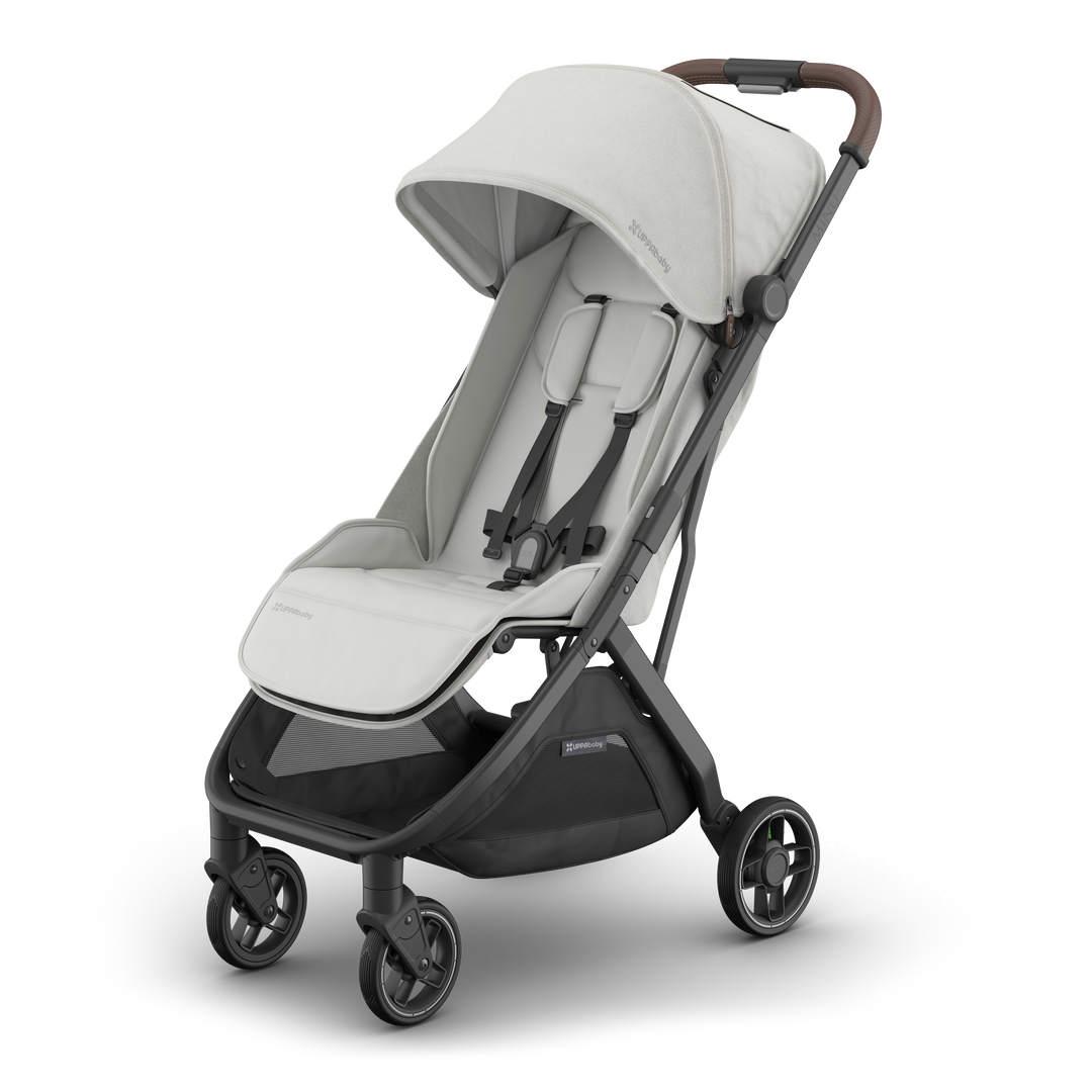 Savannah UPPAbaby Minu V3 seen in a 3-quarter left view with sunshade Ð the best stroller for walks.