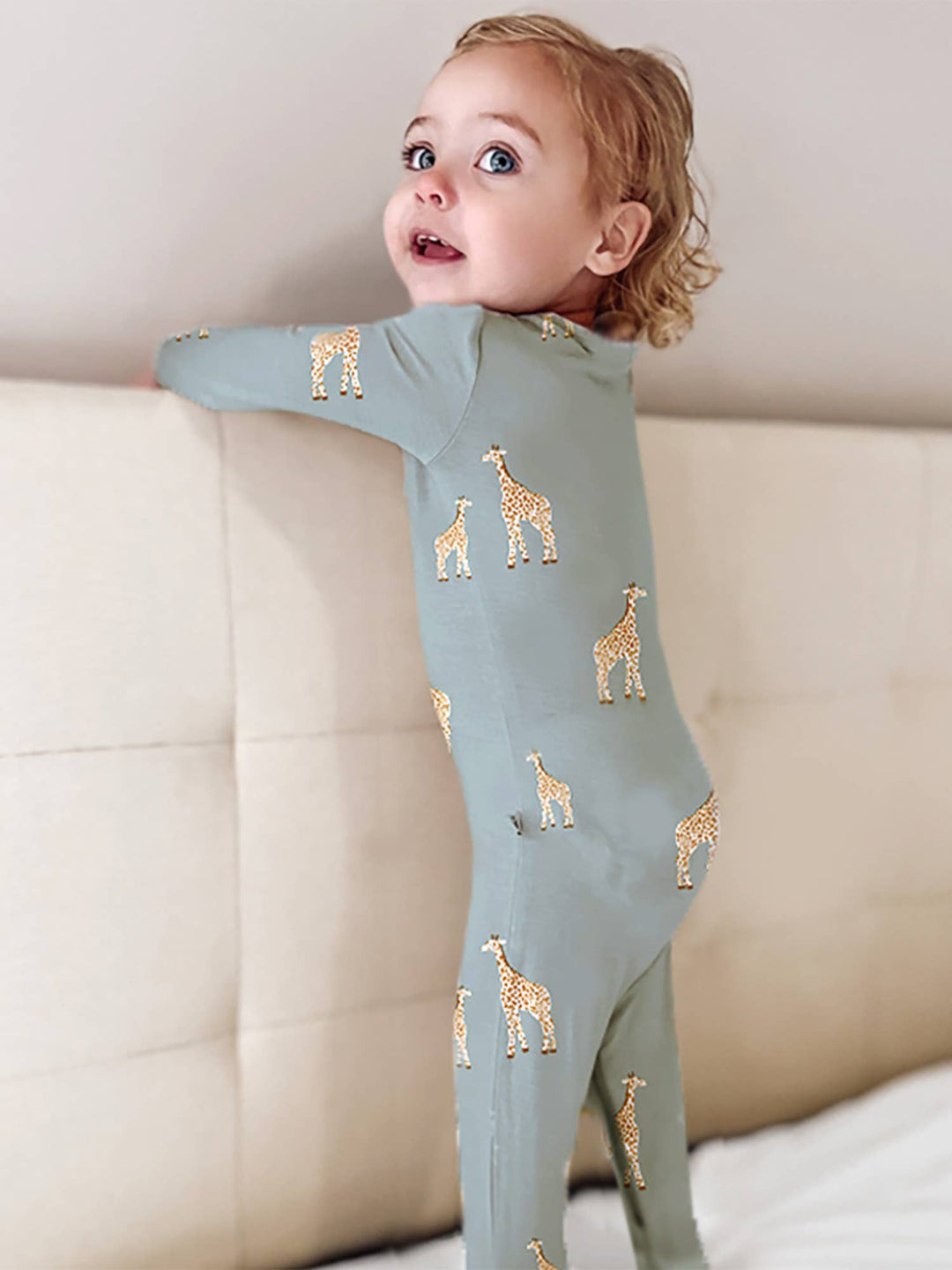 Gunamuna Convertible Baby Pajamas in Giraffe Moss, soft baby girl pajamas made from bamboo fabric.