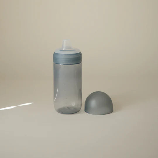 Mushie Soft Spout Sippy Cup August flat lay top view - detachable silicone spout cup for babies 6 months plus