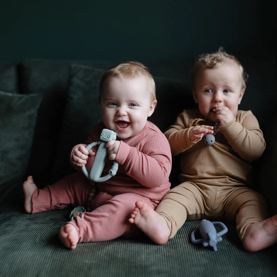 Mushie baby teether in robot shape with rattle sound for comfort