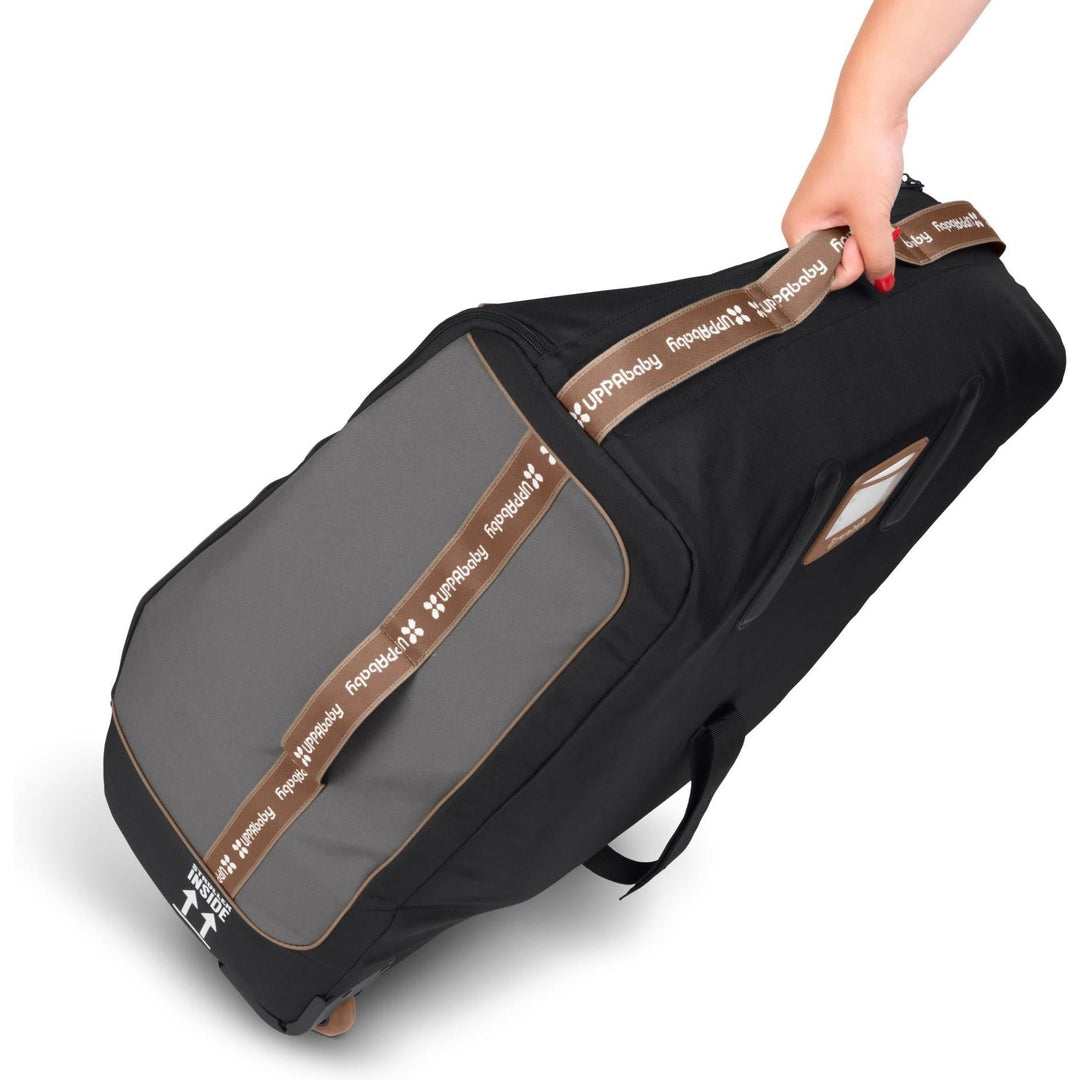 UPPAbaby Kona Travel Bag shown rolling, airport-ready stroller travel bag