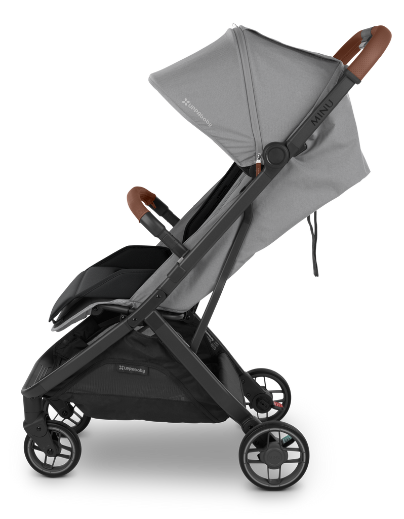 Side view of Saddle UPPAbaby Minu V3 Bumper Bar Ð Accessorize your lightweight stroller with this stylish and functional bumper bar in saddle.