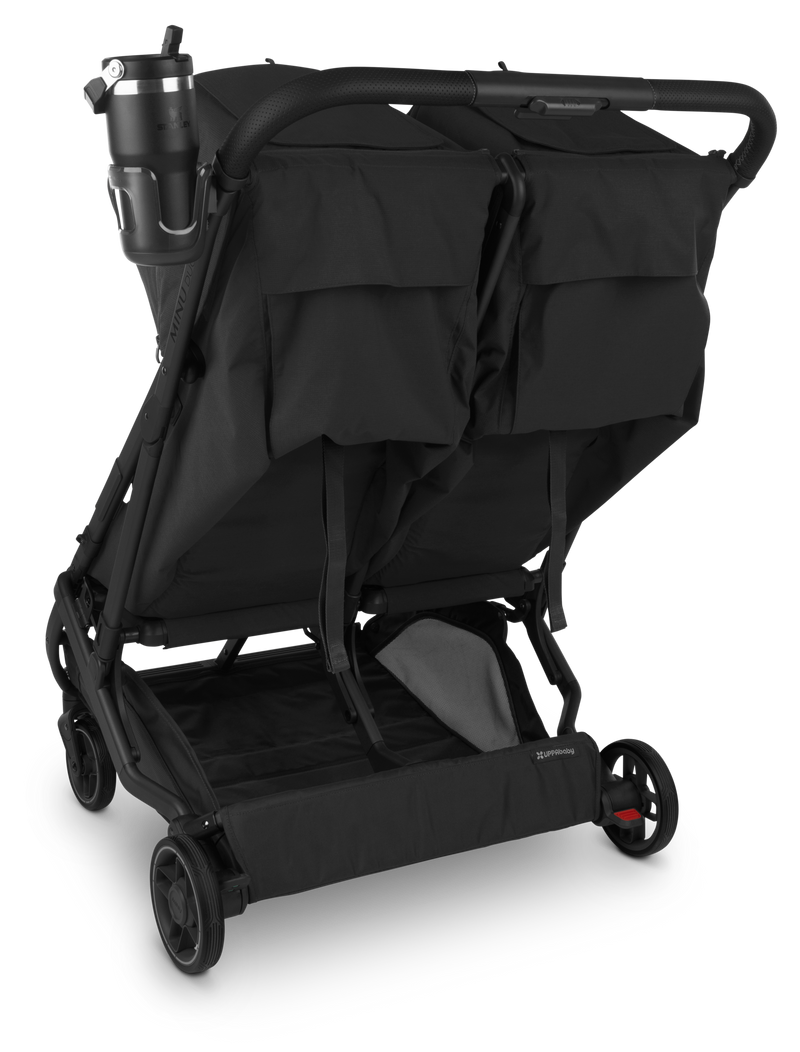 UPPAbaby Minu V3 Cup Holder on stroller with 3-quarter back view, a must-have stroller accessory for easy drink access.