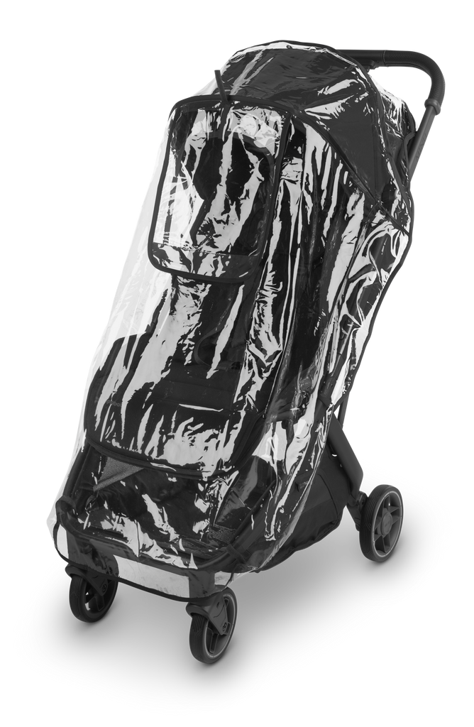 UPPAbaby Minu V3 Rain Shield fitted on a travel stroller. Durable, transparent cover shields against rain and wind. Lightweight stroller essential for all seasons.