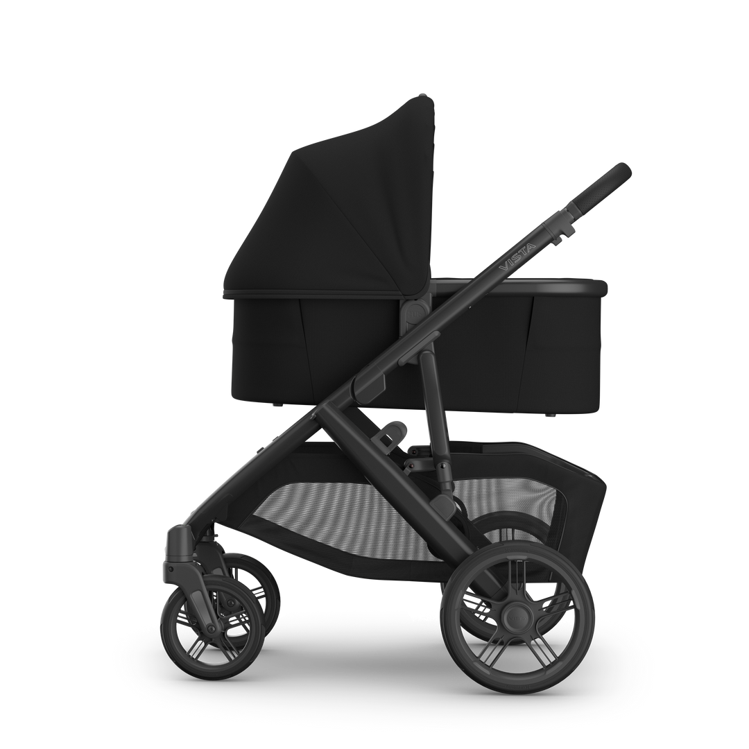 UPPAbaby Bassinet V3 James Black on Vista V3 side — all-black infant bassinet on full-size stroller