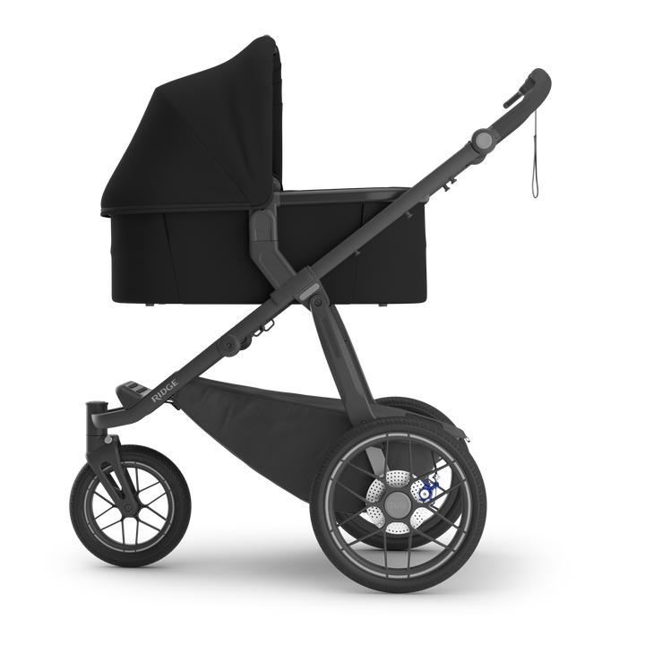 UPPAbaby Bassinet V3 James Black on Ridge stroller side — all-black bassinet compatible with Ridge V2
