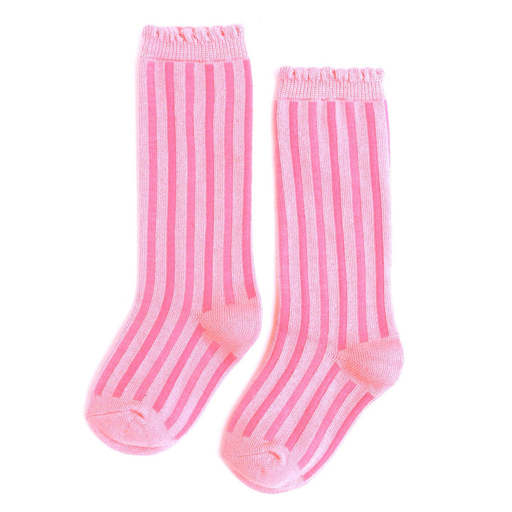 Pink and white striped knee-high socks with scalloped trim, the Blossom style from Little Stocking Co.