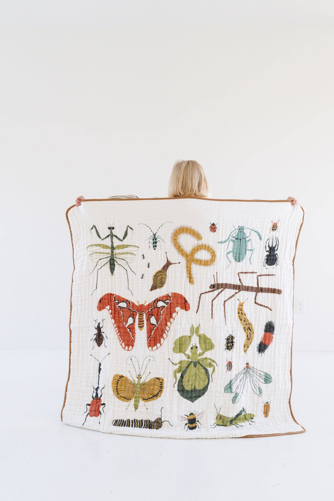 Soft muslin baby blankets featuring Clementine Kids Cutie Crawlies Quilt, designed for comfort and playtime.