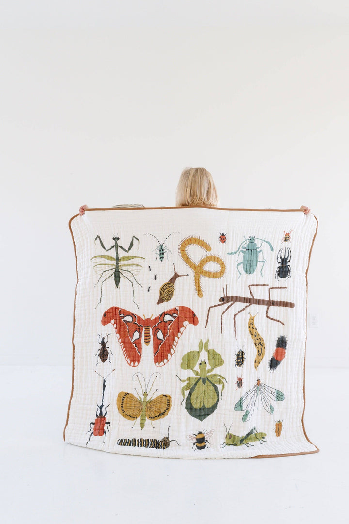 Soft muslin baby blankets featuring Clementine Kids Cutie Crawlies Quilt, designed for comfort and playtime.