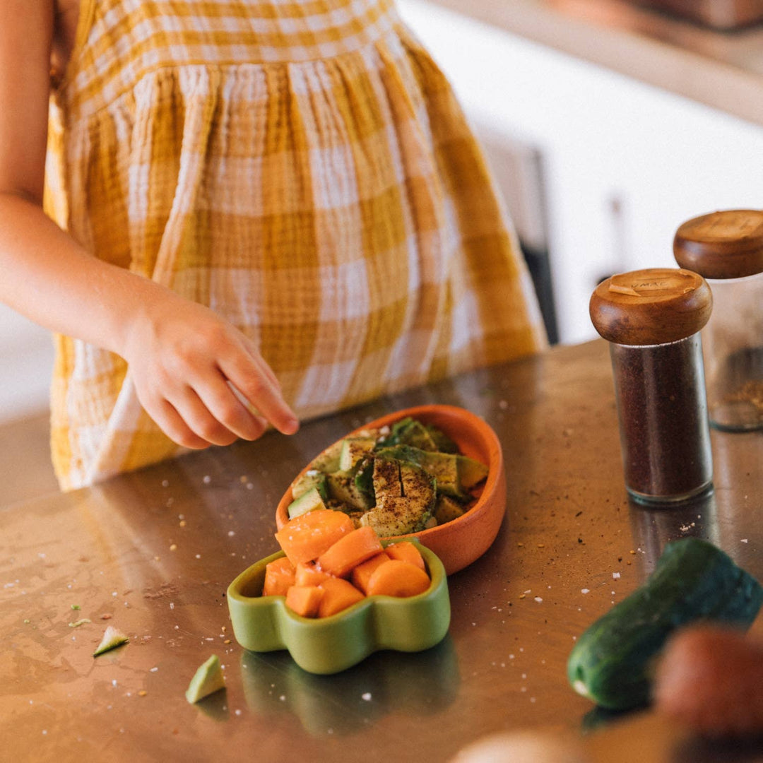 olli and carol wooden carrot toddler plate with avocado and cantaloup 