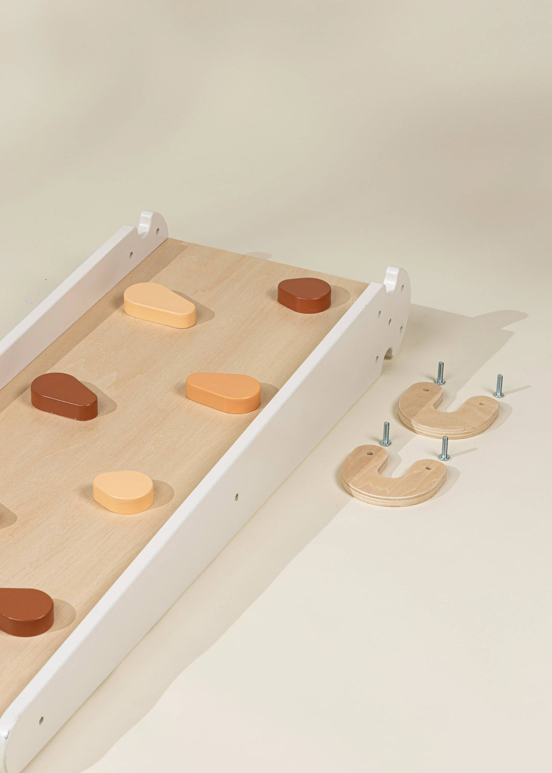 Let creativity climb with the Coco Village Montessori 2-in-1 Grip Climber Board & Slide in Natural, built for Montessori toy exploration.