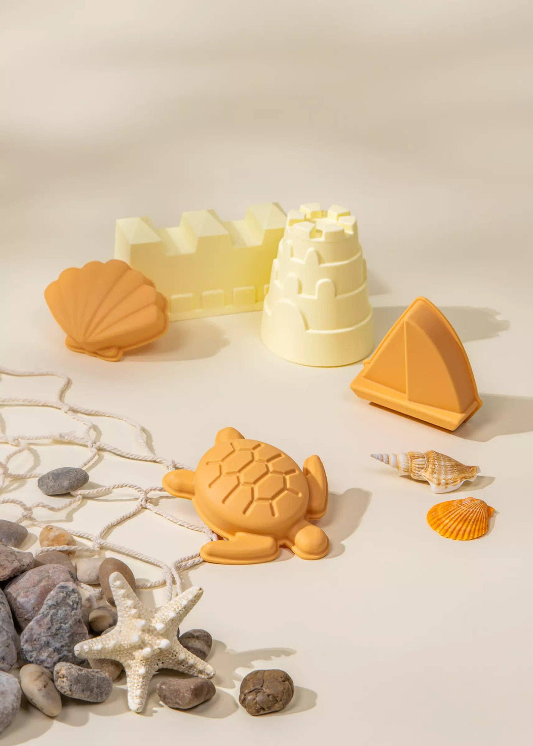 Shape and scoop with the Coco Village 5 Silicone Sand Moulds in Multicolor, a playful organic activity set.
