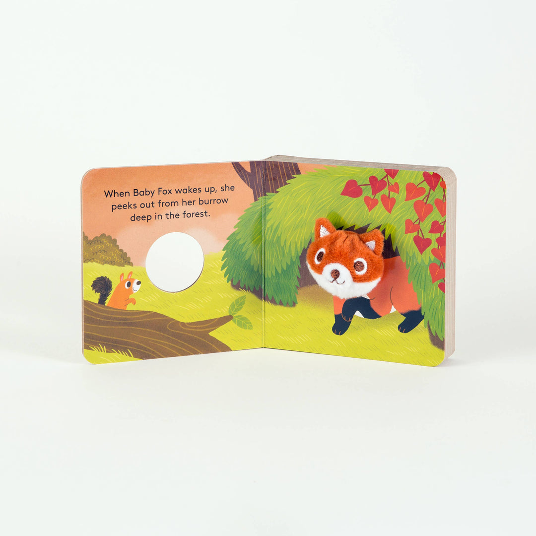 Interior spread of Baby Fox Finger Puppet Book with daytime forest meadow scene