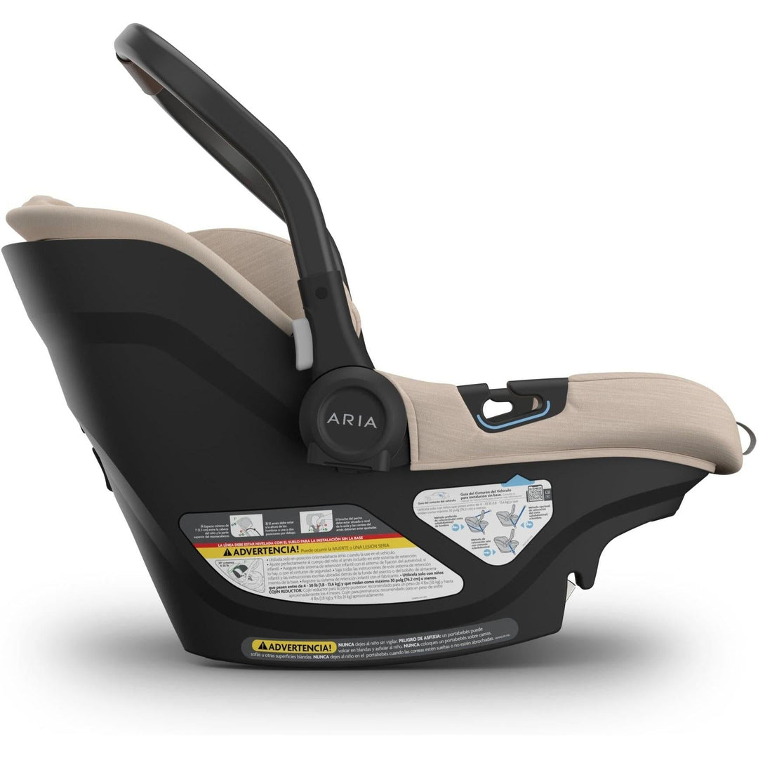 Uppababy Aria V2 Infant Car Seat in Declan showcases adjustable handles for the best baby car seat mobility.