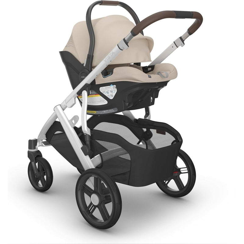 Uppababy Aria V2 Infant Car Seat in Declan securely fastened to stroller, offering modern comfort for baby travel.