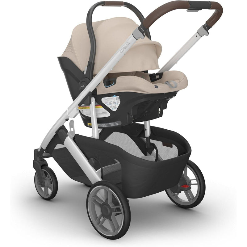 The Declan Uppababy Aria V2 Infant Car Seat connects effortlessly to the stroller, blending luxury and safety.