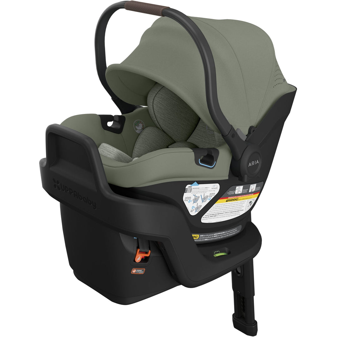 Three-quarter left hero angle of the Uppababy Aria V2 Infant Car Seat in Evelyn, showcasing chic style and smart functionality.