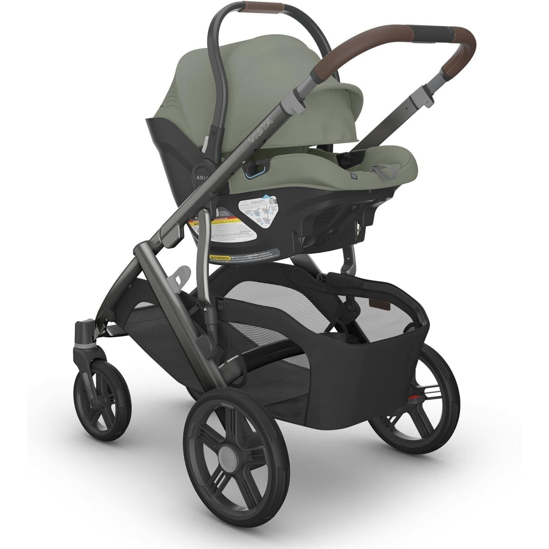 Uppababy Aria V2 Infant Car Seat in Evelyn paired with Vista stroller for effortless travel and modern infant car seat design.