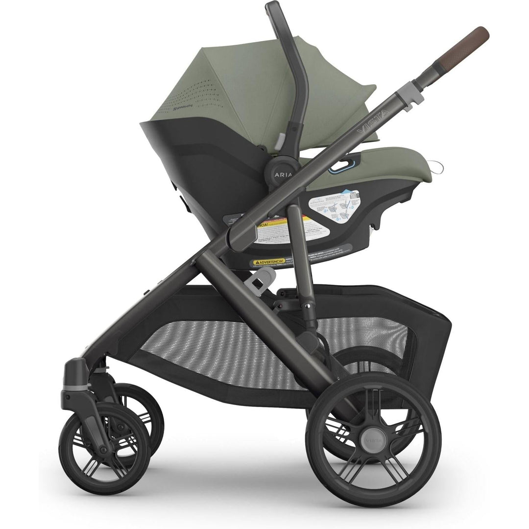 Evelyn Uppababy Aria V2 Infant Car Seat attached to Vista stroller, highlighting an elegant and secure newborn car seat system.