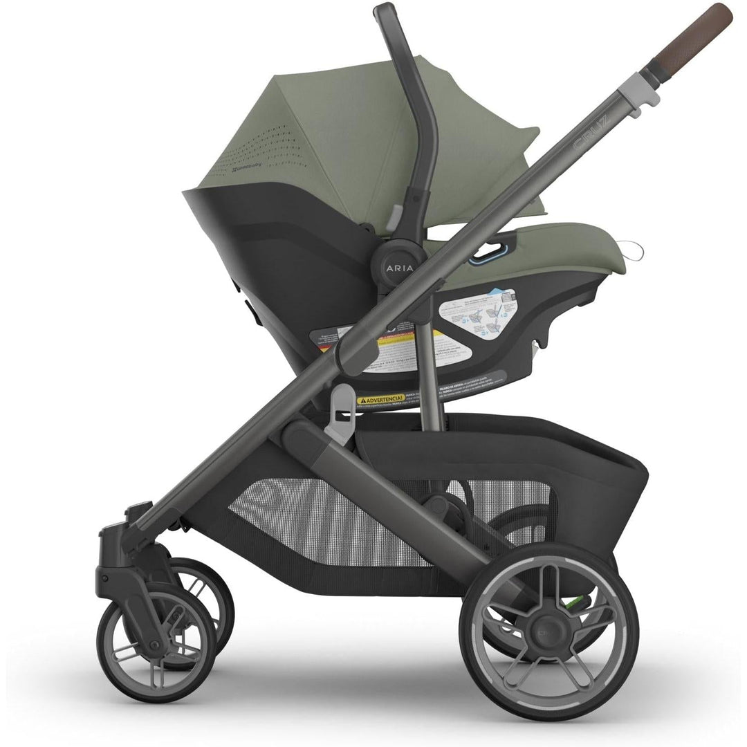 Side view of Uppababy Aria V2 in Evelyn on Cruz stroller, a lightweight and best car seat for newborns on the go.