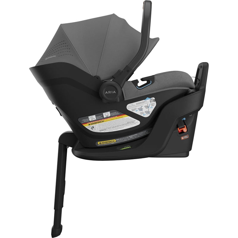 Left side view of the Uppababy Aria V2 in Greyson captures its sleek silhouette and reliable newborn car seat design.