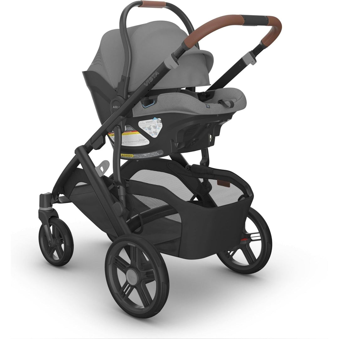 Front view of the Uppababy Aria V2 Infant Car Seat in Greyson shows modern contours and top-tier craftsmanship.