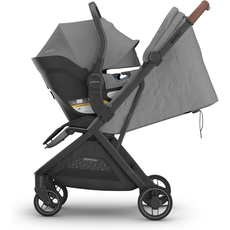 Uppababy Aria V2 Infant Car Seat in Greyson connected to the Minu stroller, ideal for families needing a lightweight best car seat.