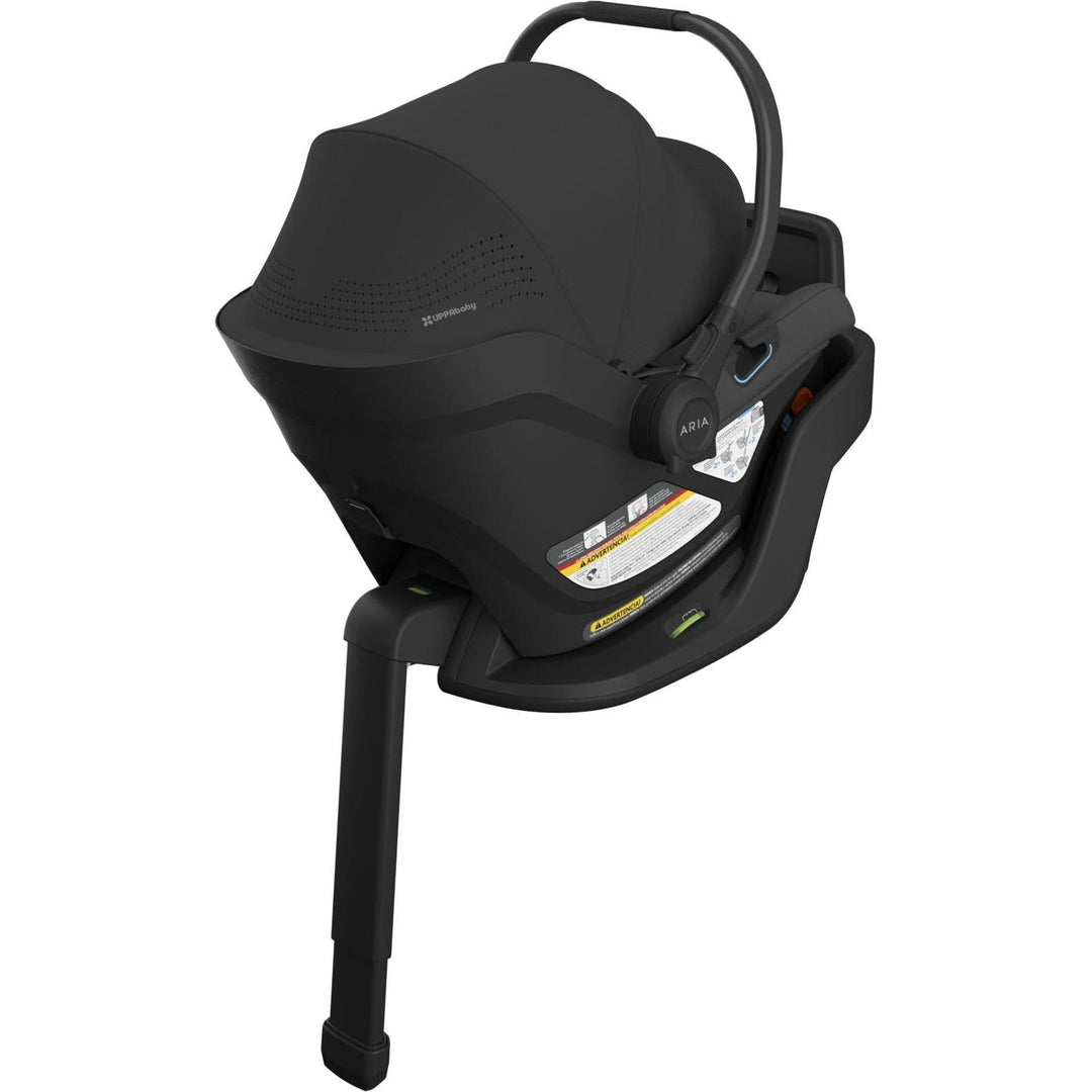 The Uppababy Aria V2 in Jake presents a durable build and refined finish, ideal for families seeking premium car seats.